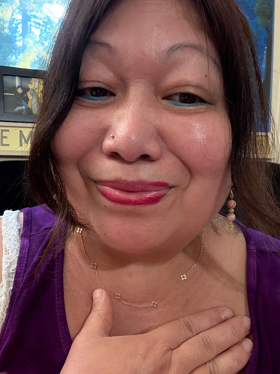 Thumbnail: Smiling woman with dark hair