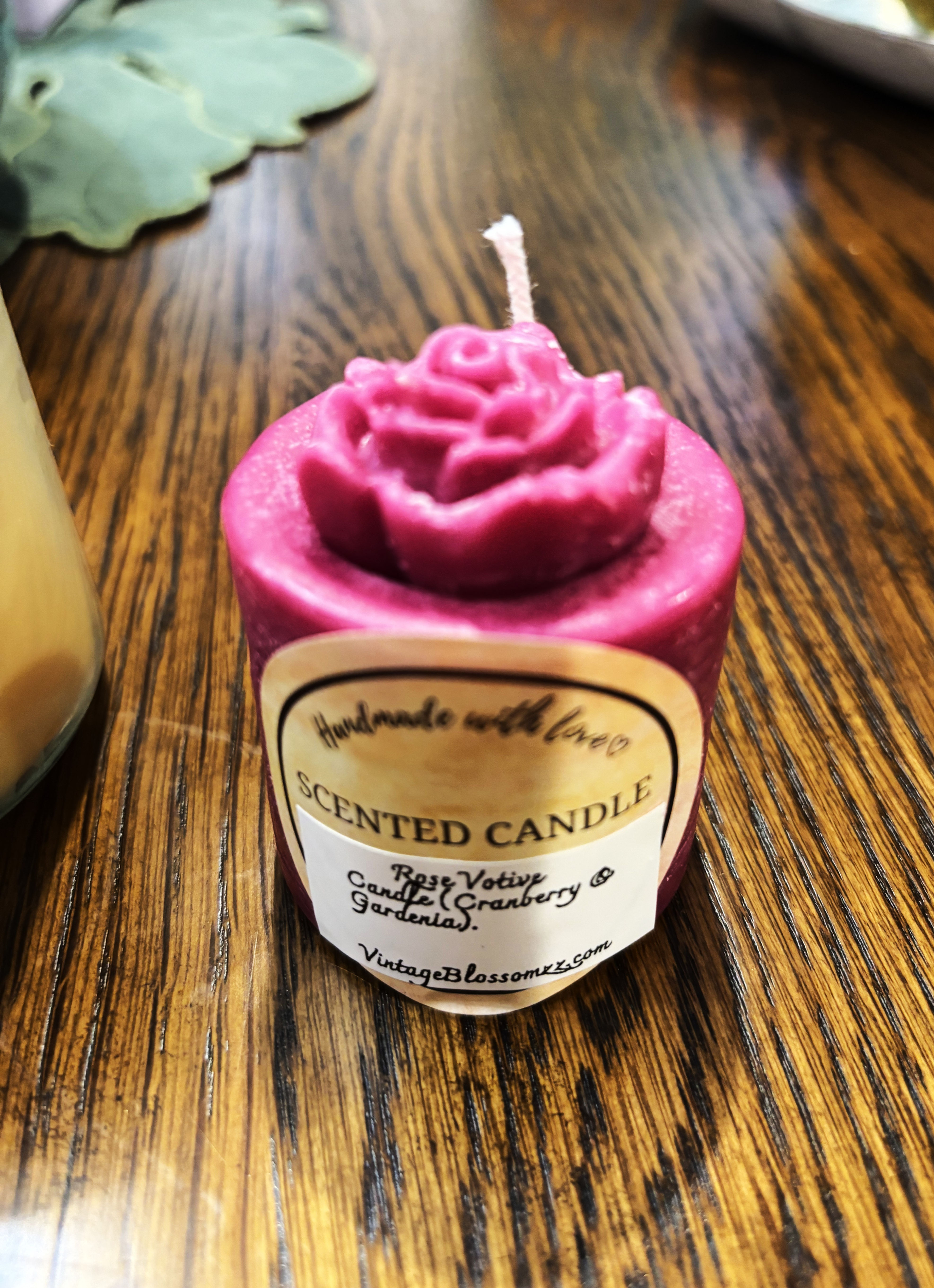 Pink rose scented candle with 'Handmade with love' label