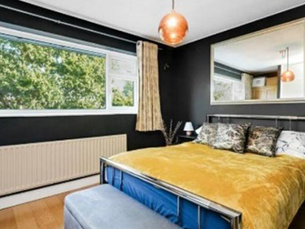 From Bland to Bold: A Moody Bedroom Makeover in Hampton Court