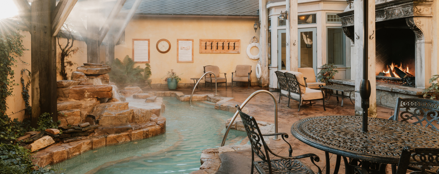 indoor Aqua Terrace with oversized fireplace and hot spa whirlpool