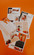 Mango Marketing Co. magazine features printed out and laying on an orange backdrop