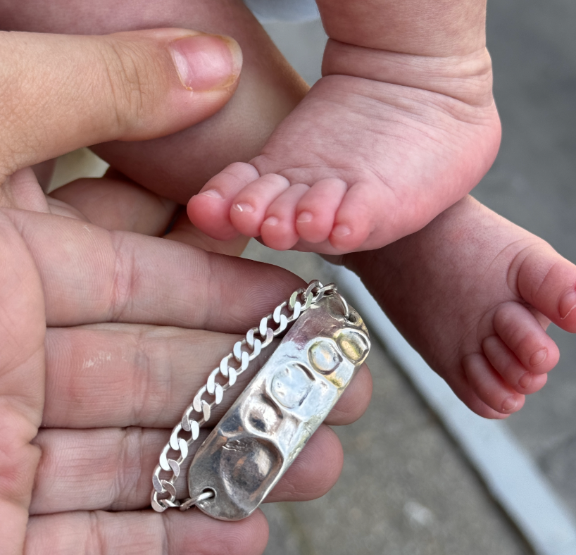 Miniatura: Pulcera hombre huellas bebé