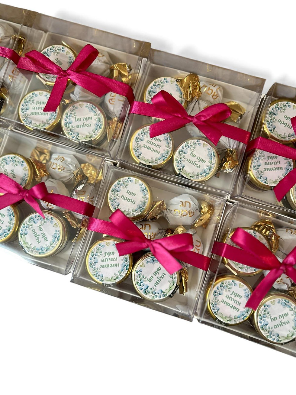 שורת מארזי חג לעסקים- דבש קטן, סילאן, ריבה ושוקולד עטופים בקופסה שקופה מעוצבת