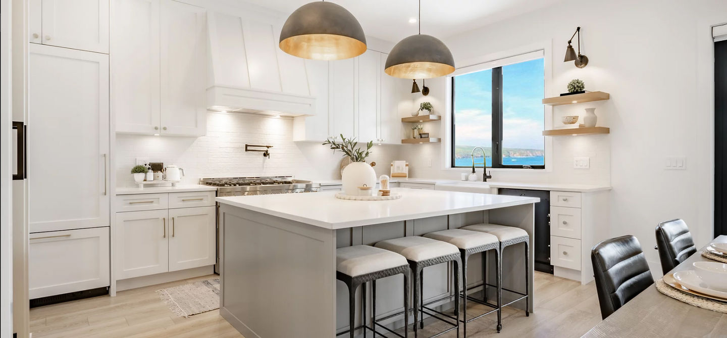 Large Open Concept Beach House Kitchen with White Shaker Cabinets and Coordinating Grey Shaker Kitchen Island from the Pacific Shaker Cabinet Collection, a Quality All Wood Cabinet Series Featuring Standard Soft Close Features, Matching Interiors, and Customization Options. These Beautiful Cabinets are Available Fully Assembled, or Request these as an RTA Cabinet Option.