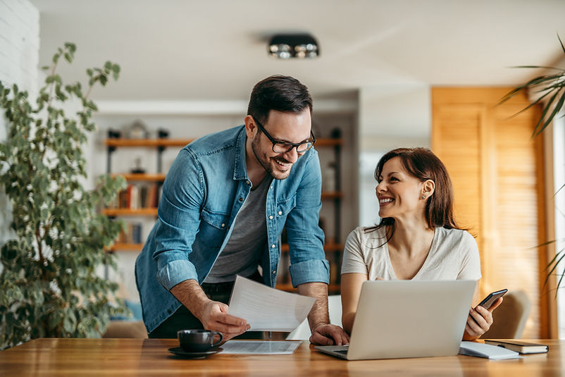 Portrait of successful smiling small business owners at cozy office..jpg