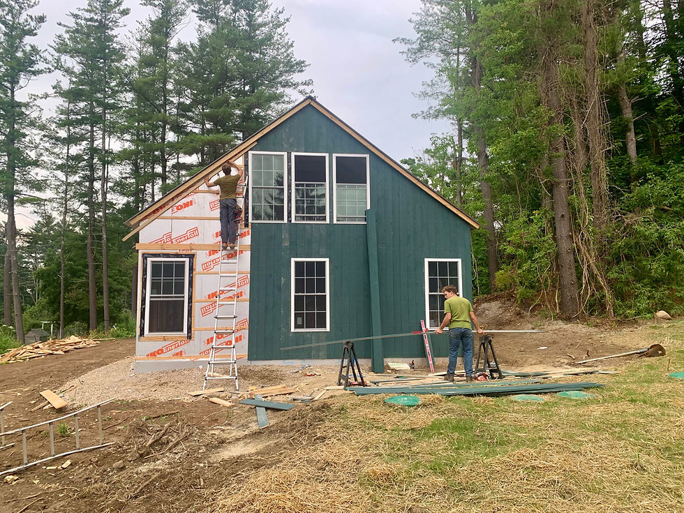 Dolan and Isaac work on the east wall