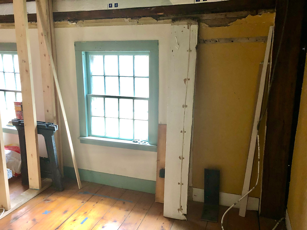 A bedroom upstairs was so dark and depressing, we decided to make half of it the master bath, and the other half the laundry room. We raised the ceiling, too.