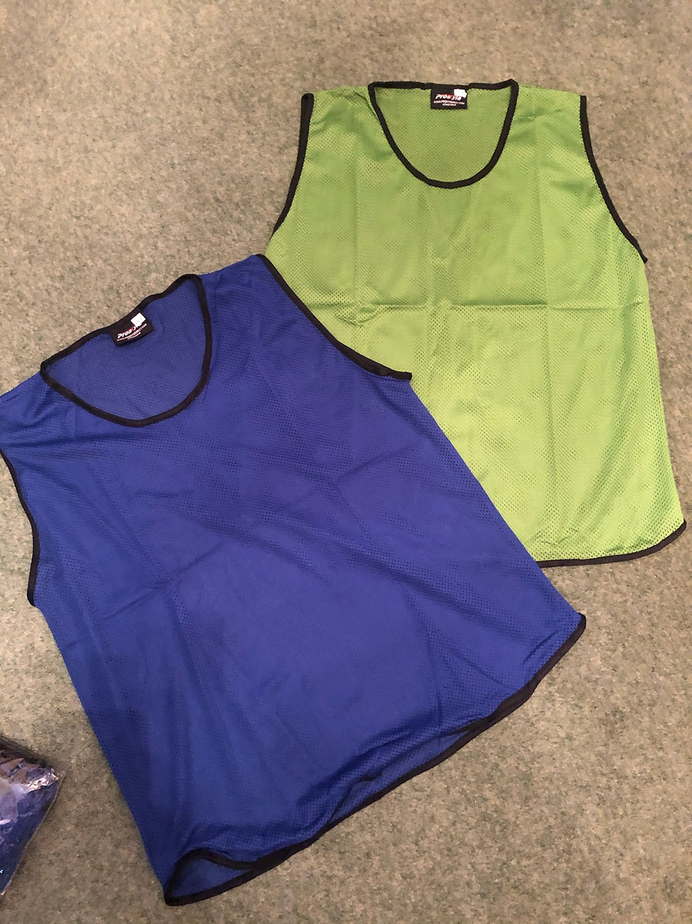 Blue and green vest tops for sports activities