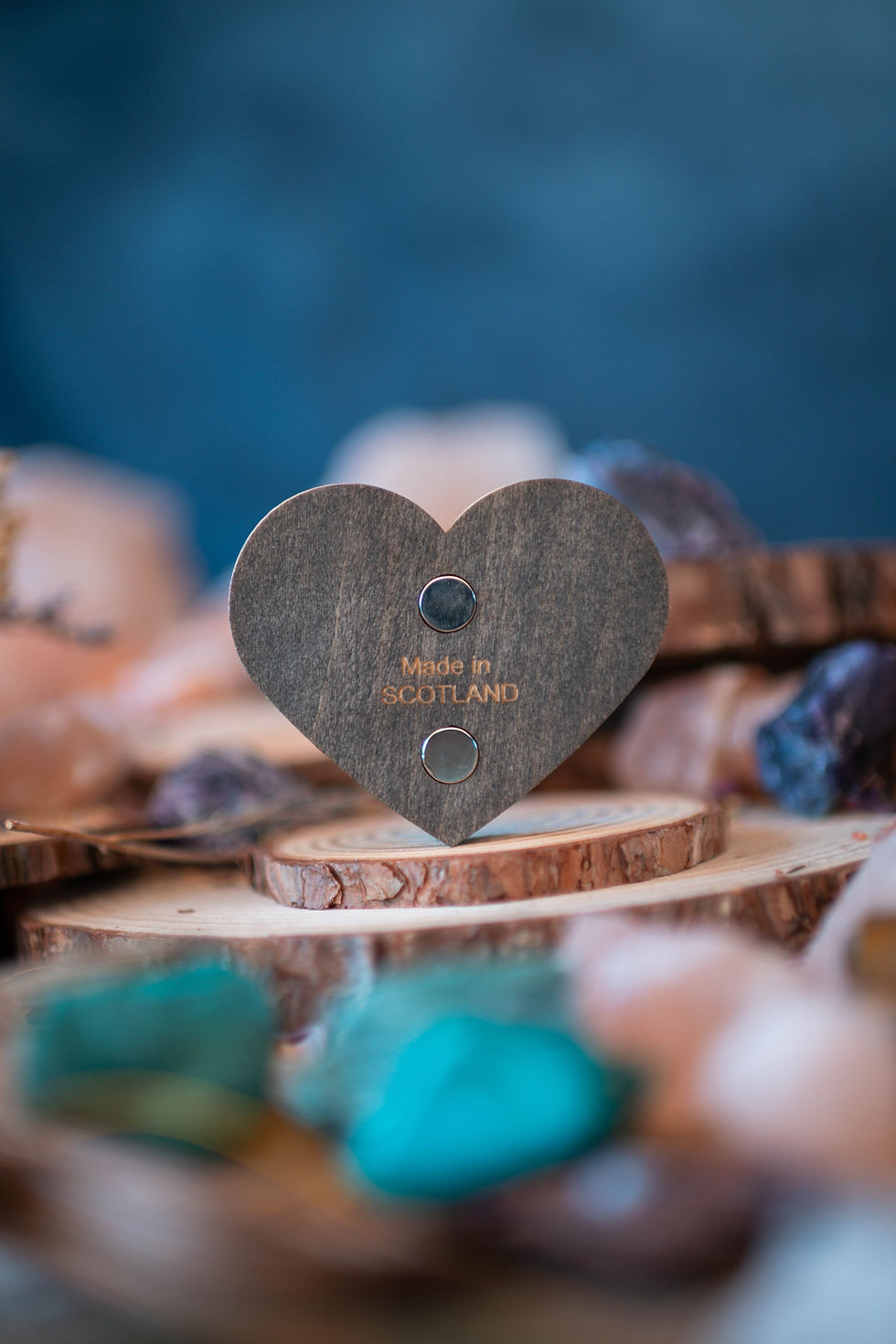 Thumbnail: Heart-shaped magnet back on wood