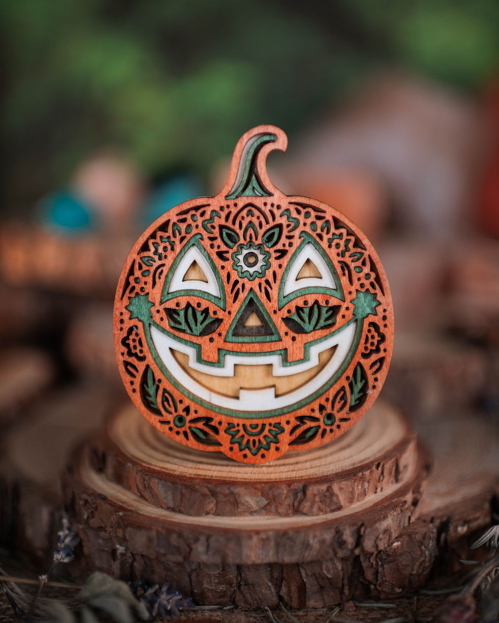 Thumbnail: Intricate carved wooden pumpkin decoration