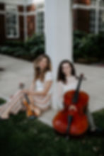 2 of City Six Musicians holding instruments