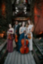 City Six Strings musicians holding instruments