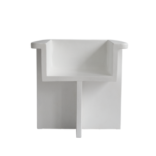 The Brutus Collection by 101 Copenhagen features a dining chair, lounge chair, coffee table and stool all cast in lightweight fibre concrete. Modern, minimalist architectural furniture that can be used in covered patios.