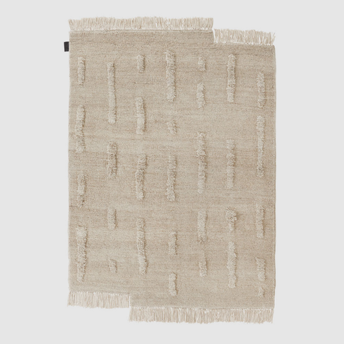 Sera Helsinki hand knotted rug on the loom, ethically and sustainable hand made in pure sheep wool.