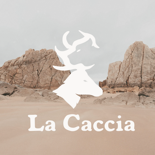 White deer logo with La Caccia text on a beach background