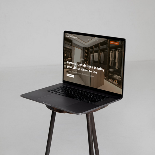 Laptop displaying website with closet design, bringing your closet vision to life. Seattle custom website design