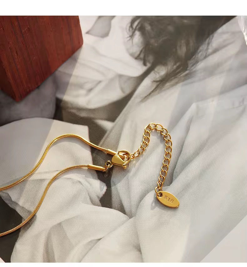 Thumbnail: Kuona 18K Gold-Plated Cylindrical Zircon Hollow Pendant Necklace