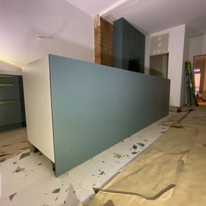 IKEA kitchen with green doors.