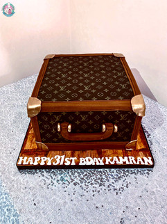 Louis Vuitton brief case cake.