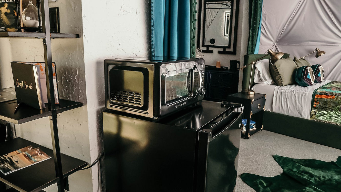 kitchette with micro kettle and mini fridge