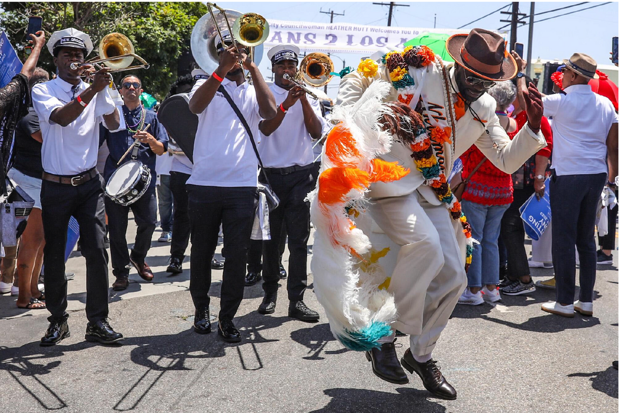 A New Orleans delegation led by Mayor LaToya Cantrell joins a second line Saturday along the newly christened New Orleans Corridor, a roughly 1-mile stretch of Jefferson Boulevard in South Los Angeles.