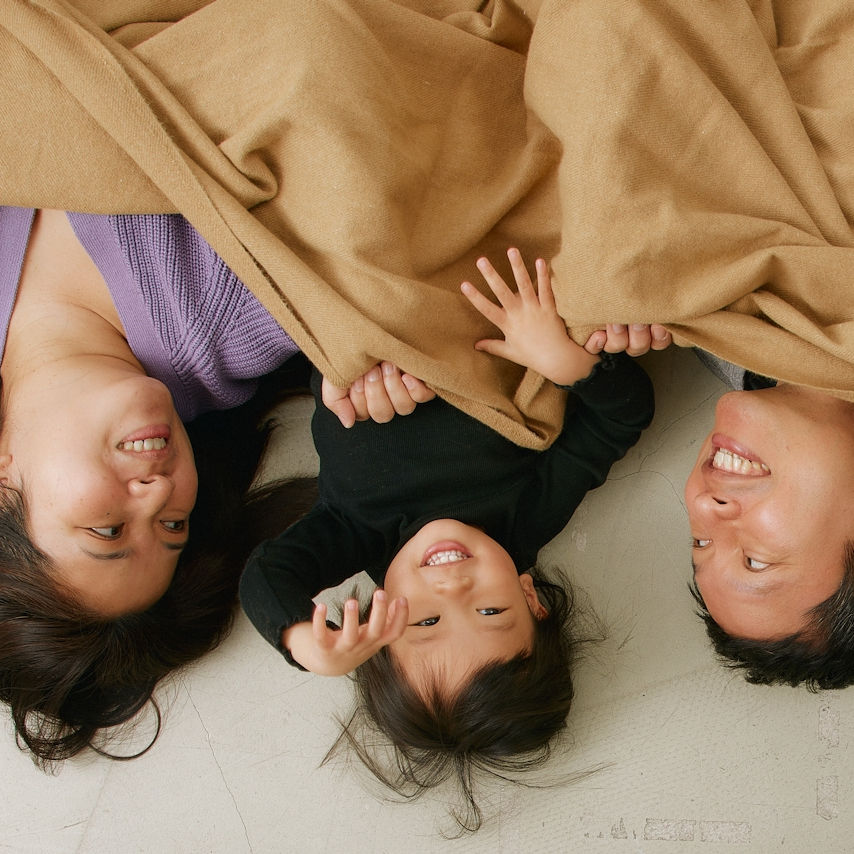 Parents help their child with sleep regression. Their child is in therapy at the best child therapy clinic in LA.