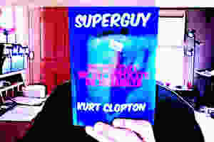 Photo of the cover of the review copy of my book, SuperGuy.
