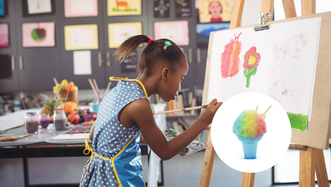 Young girl painting on easel, colorful art and snow cone, classroom setting
