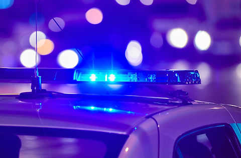 police-car-lights-at-night-city-street-2021-08-31-18-12-07-utc_edited.jpg