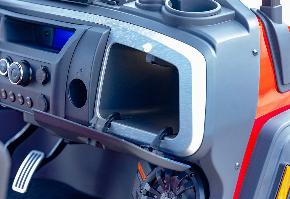 Thumbnail: Onward LSV dashboard with open glove box and speaker
