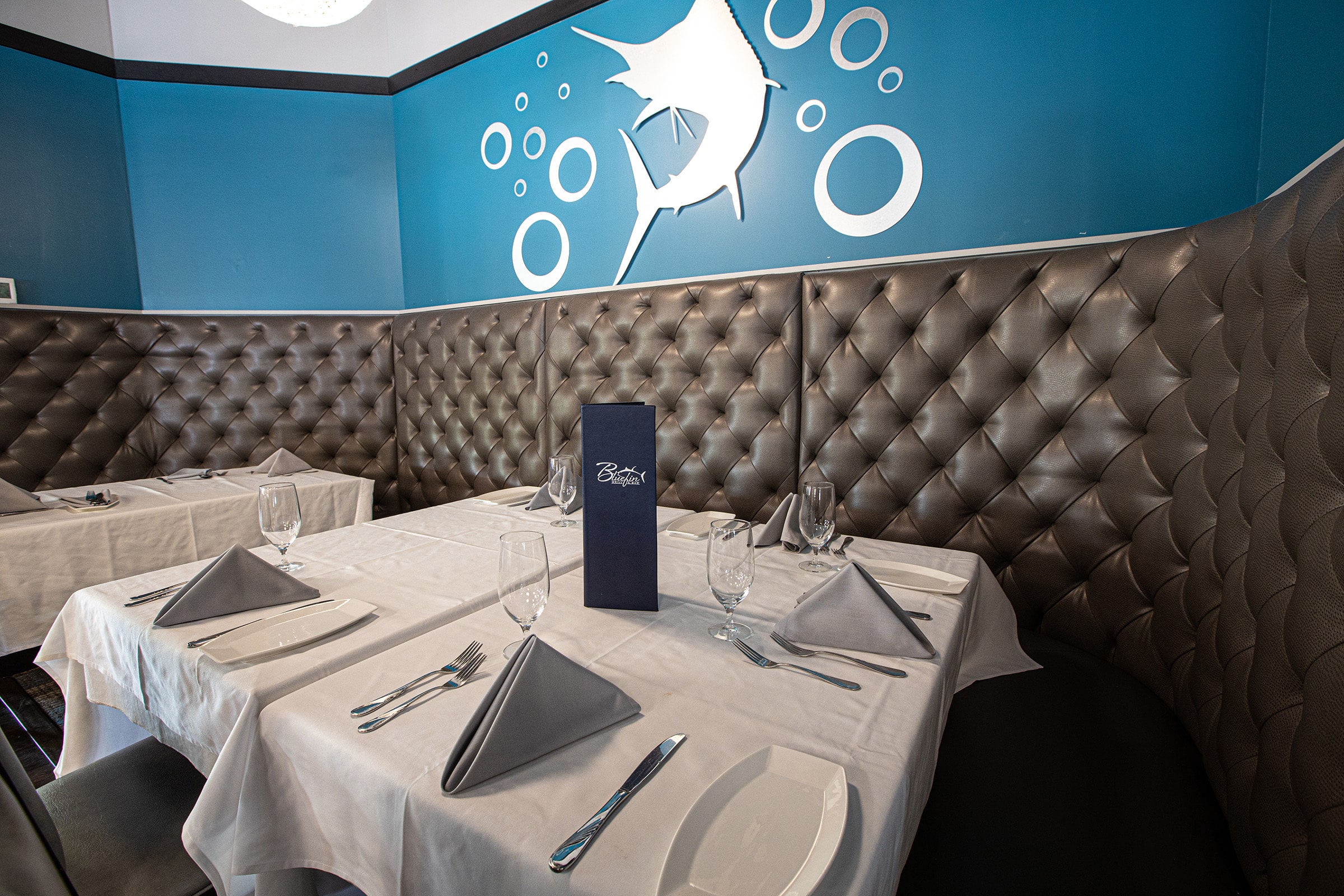 Booth seating at Bluefin Grill & Bar
