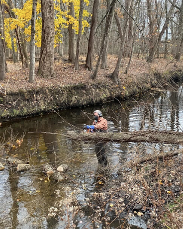Ray clearing a recently fallen tree at Demarest Nature Center.