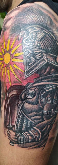 Spartan tattoo arm