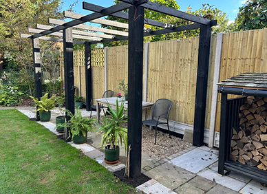 Pergola with paved seating area