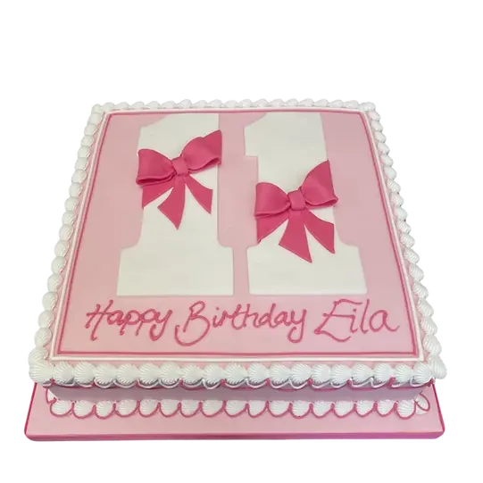 Bespoke square celebration cake shaped as number 10 with decorative bows in Solihull, West Midlands.
