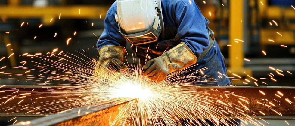 Welder working on metal with sparks for a welding quote