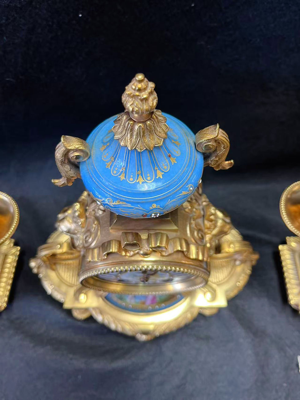 Thumbnail: French Gilt Bronze and Porcelain Clock Garniture with Candelabras