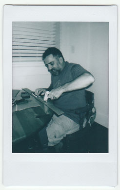 NCFF matt makes cardboard ties.jpeg