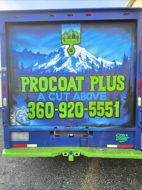 ProCoat Plus truck with blue mountain artwork, lime lettering and a white snowboarding character