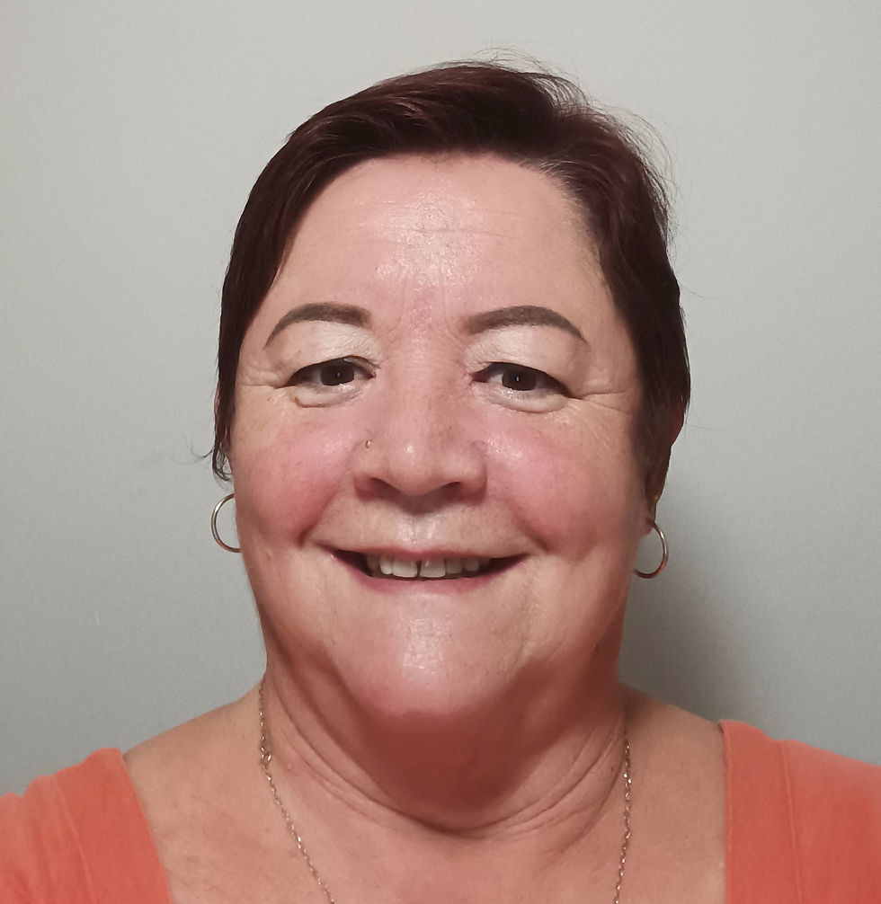 Professional headshot of a Dantae Support Services team member smiling against a neutral background.