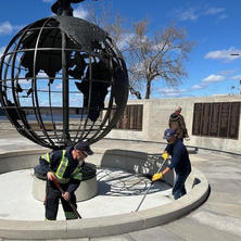 Lafleur workers cleaning a fountain