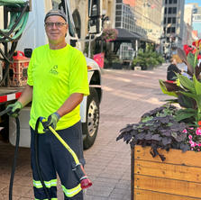 Roch watering some plants on Sparks