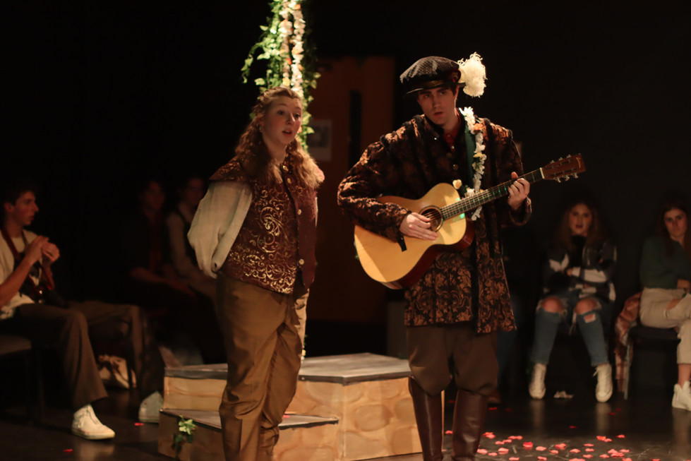 (L to R) Madelyn Goldberg as Amiens, Roan Cochrane as Lord #2, 