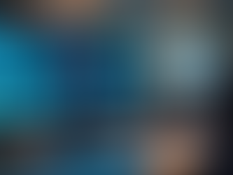 Eye-level view of a modern workspace with a computer displaying AI data visualization