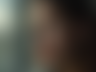 Close-up view of a person looking away while speaking