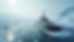 Eye-level view of an icebreaker ship navigating through melting Arctic ice
