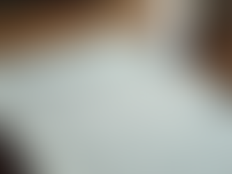 Close-up view of a notebook filled with motivational quotes and learning notes