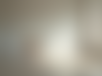 Eye-level view of a single chair in an empty room symbolizing solitude and reflection