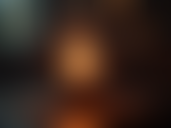 Eye-level view of a vintage Tesla coil in a dimly lit room