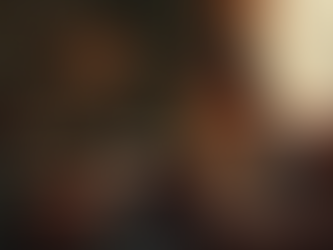 Eye-level view of a person reading a book in a cozy corner